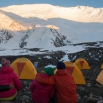 Rest and recuperation at ABC with view over the snow covered Pik Lenin.
